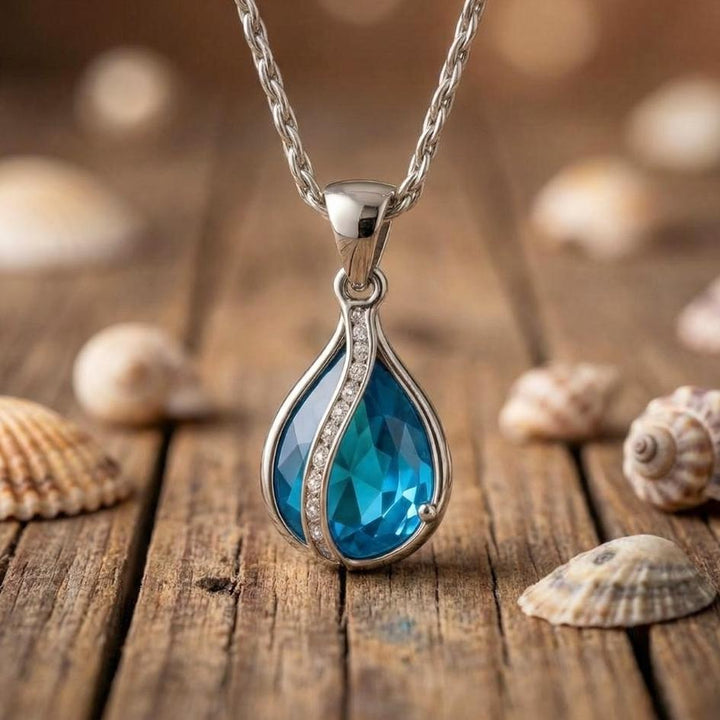 Drop of Light – Necklace with Blue Zircon and Silver Finish